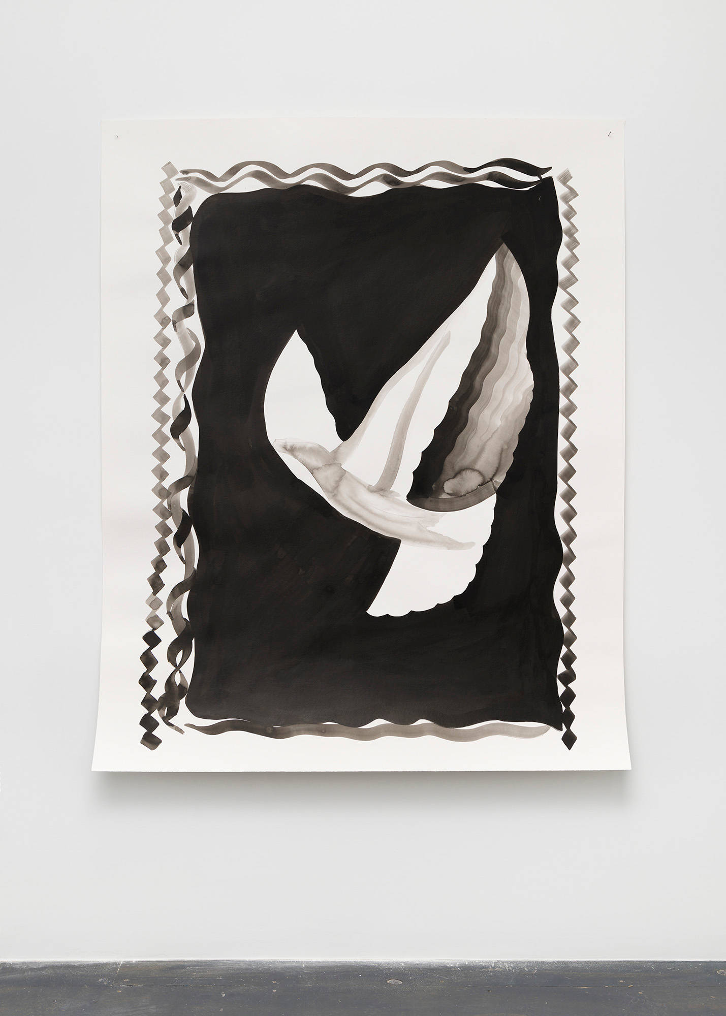A large, abstract, black ink drawing on paper hangs on a wall. It depicts a white dove against a black background.