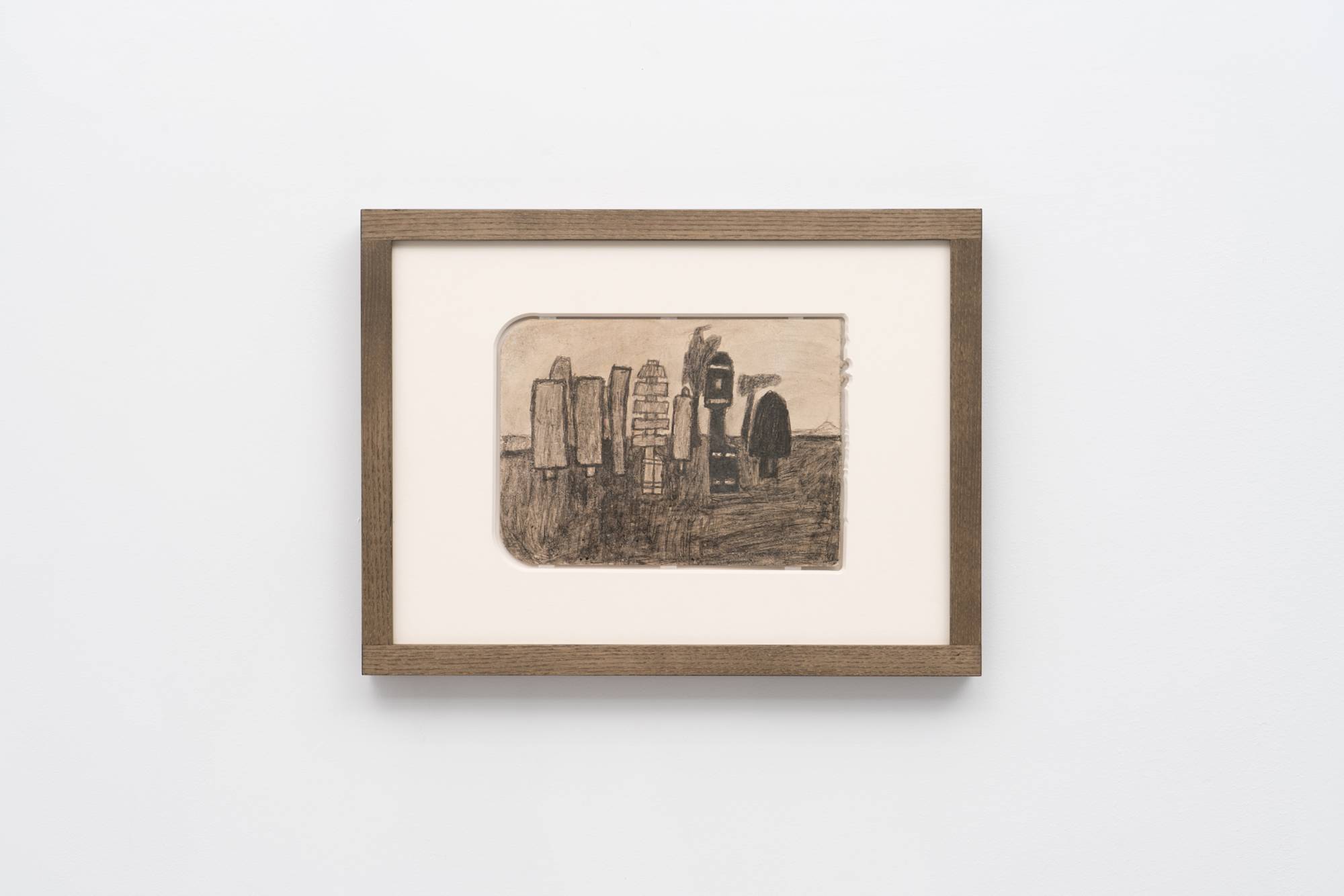 James Castle drawing featuring a landscape of abstract trees against a light sky in wood frame.