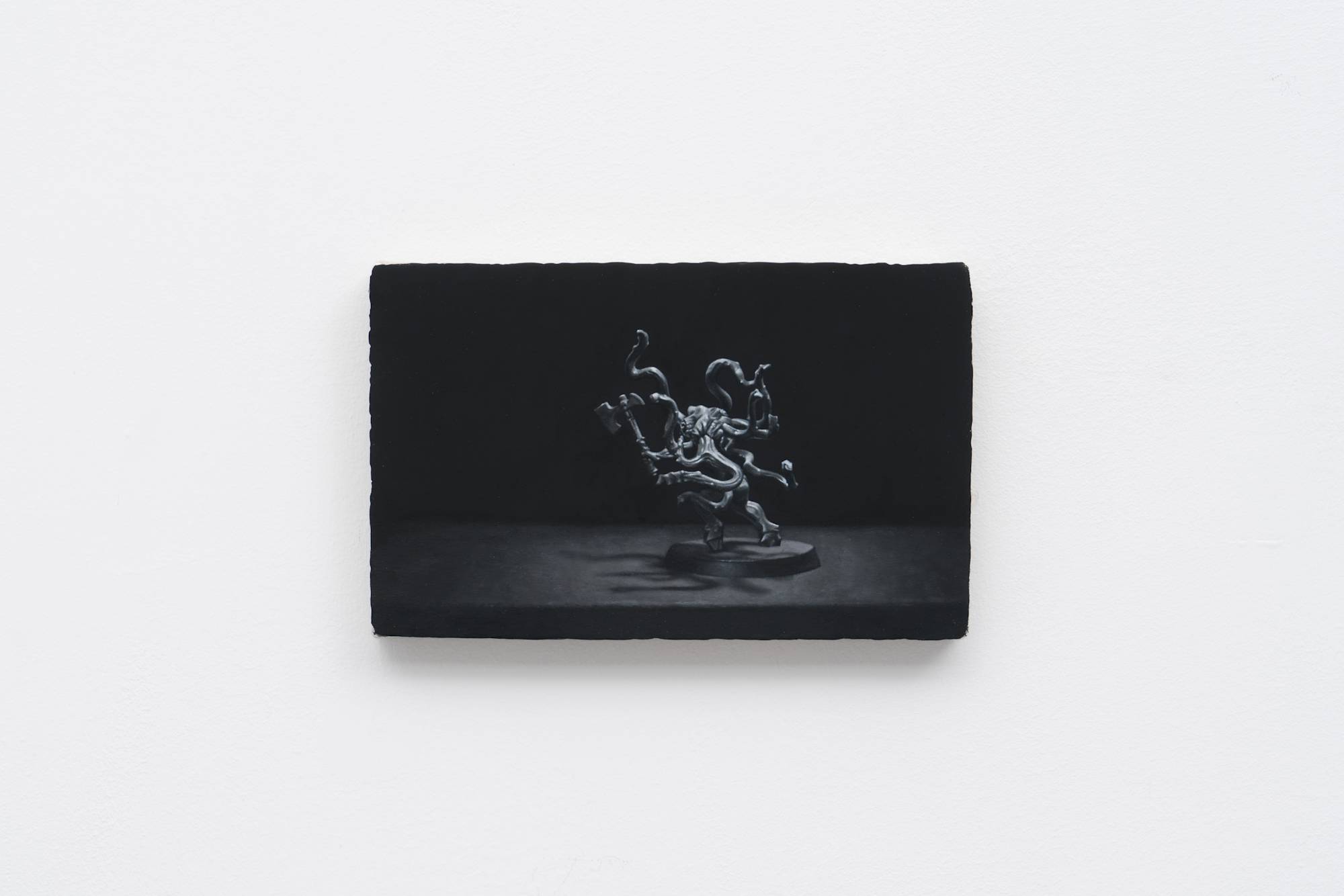 Ian Miyamura painting depicting an unpainted Warhammer figure against a black background.