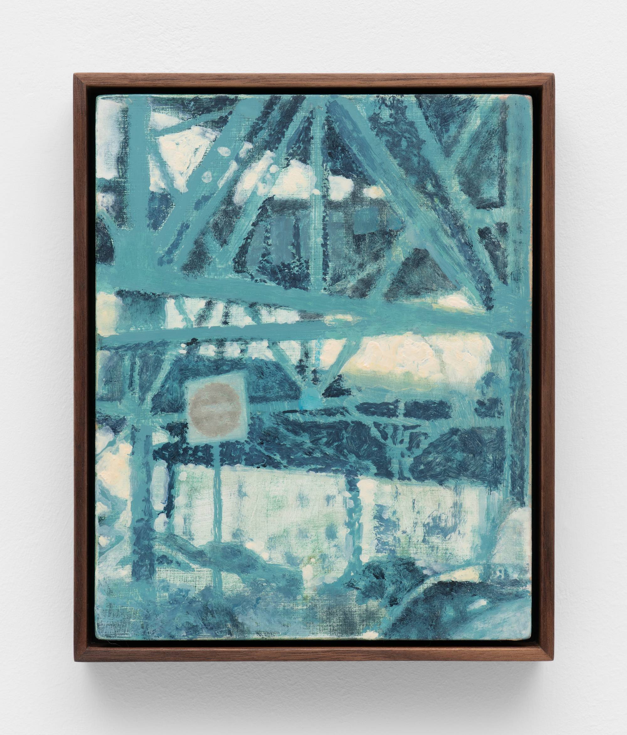 A small, dark wood framed painting of an intersection under suspended train tracks hangs on a white wall.