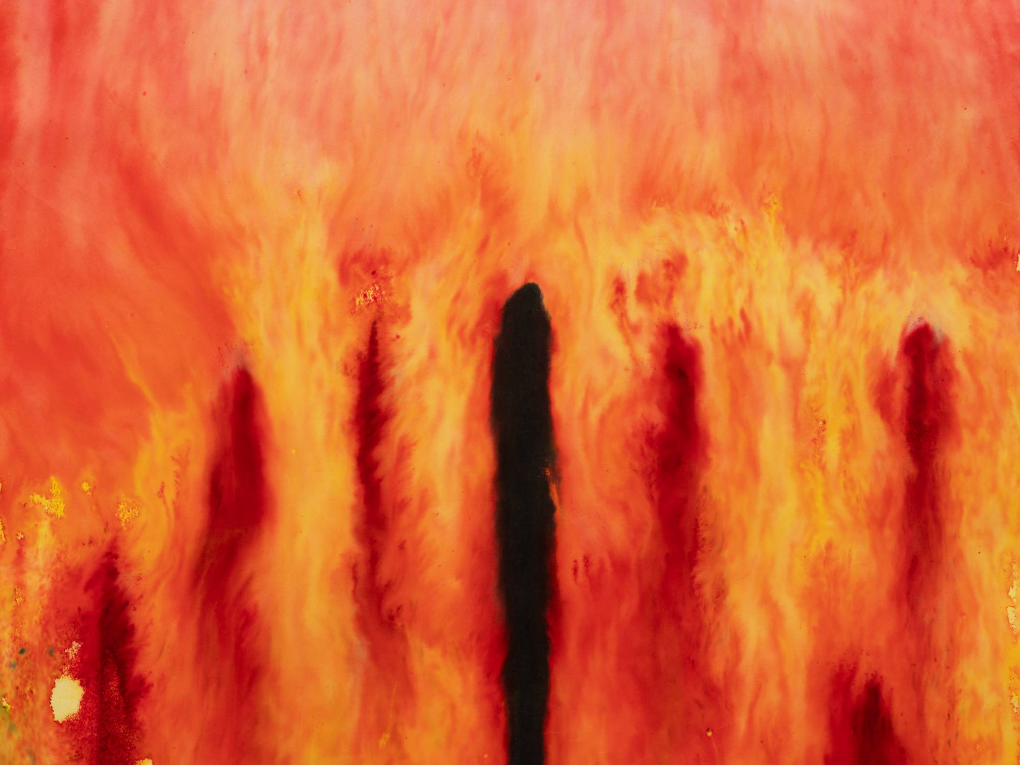 A vertically oriented close-up shot of an ink painting comprised of red, orange, yellow, and black. The top third of the composition is a wash of red. The bottom two thirds of the composition are pierced by a vertical black line extending from the bottom of the composition, which is surrounded by splotches of dark red. This close-up focuses on the area in the composition where the top black mark meets the washes of orange, red, and yellow.