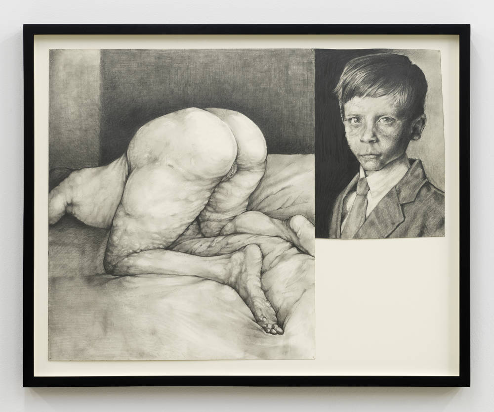 A framed graphite drawing of a small boy paired with a nude figure bent over. 