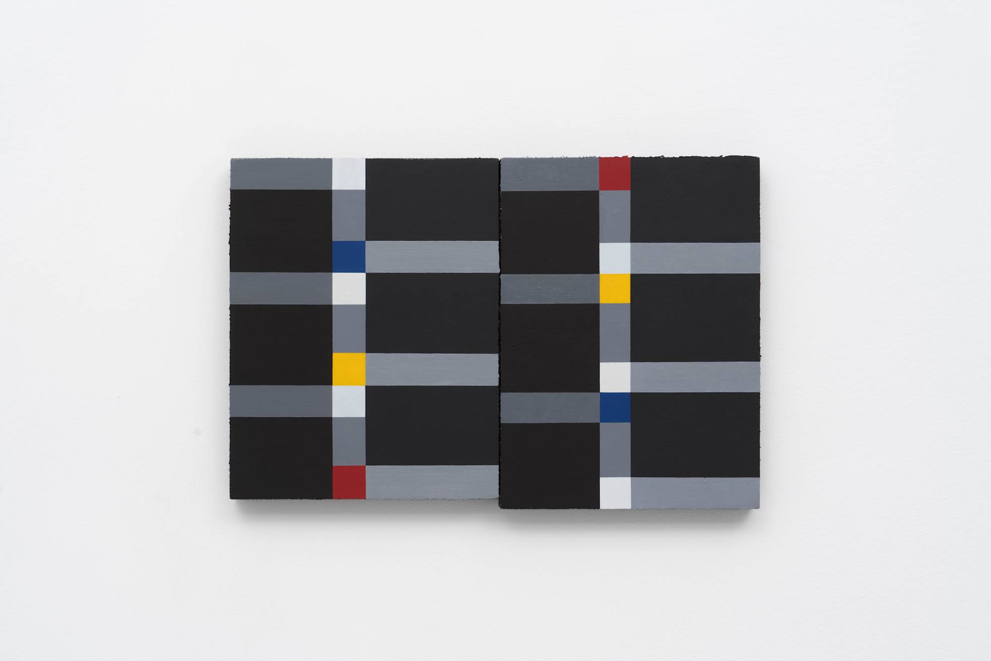 Two abstract Ian Miyamura paintings of red, yellow, blue and white squares connected by grey rectangles on a black background hang on the wall butting against each other.