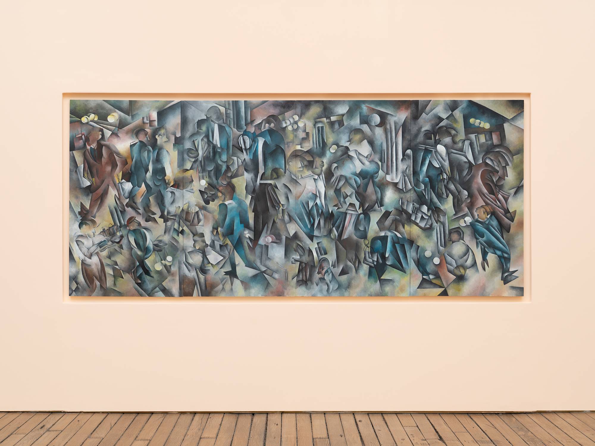 A large, horizontal painting rendered in a Cubist style hangs on a peach colored wall.