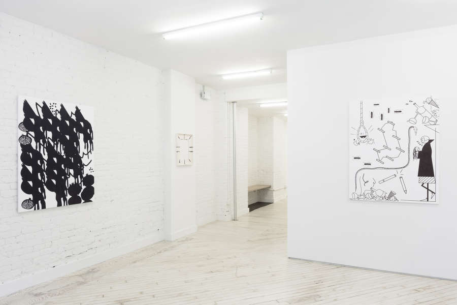 Installation view of a Jaya Howey exhibition at Bureau New York with two paintings and one ceramic frame work hanging on the walls.