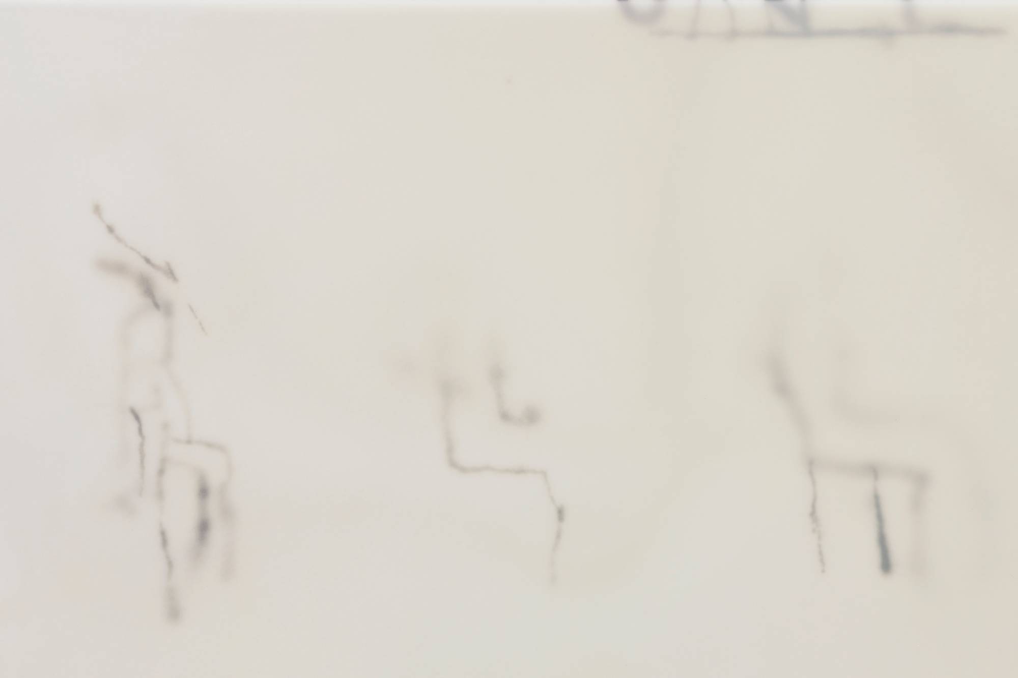 A close-up shot of a series of airbrush marks in an abstract painting.