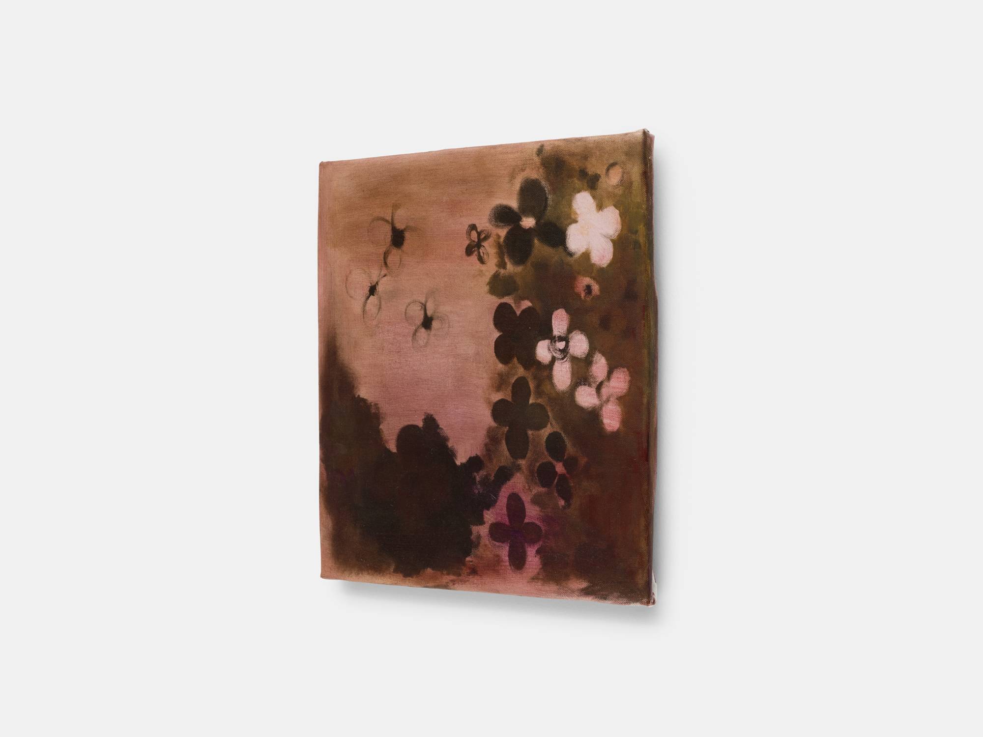 Side angle view of a small square abstract painting of flowers in hues of pink and brown.