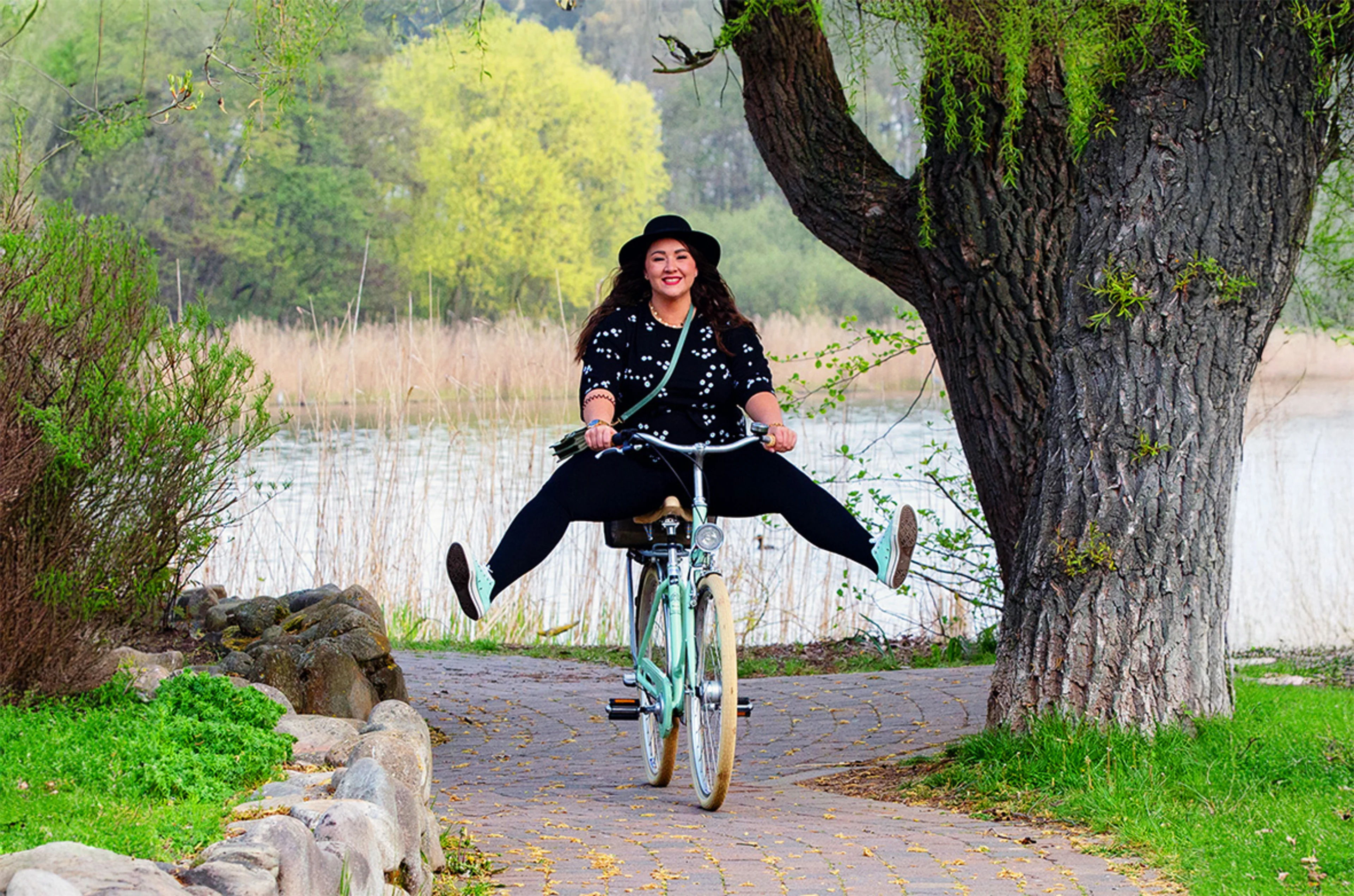 Woman riding on a bicycle.
