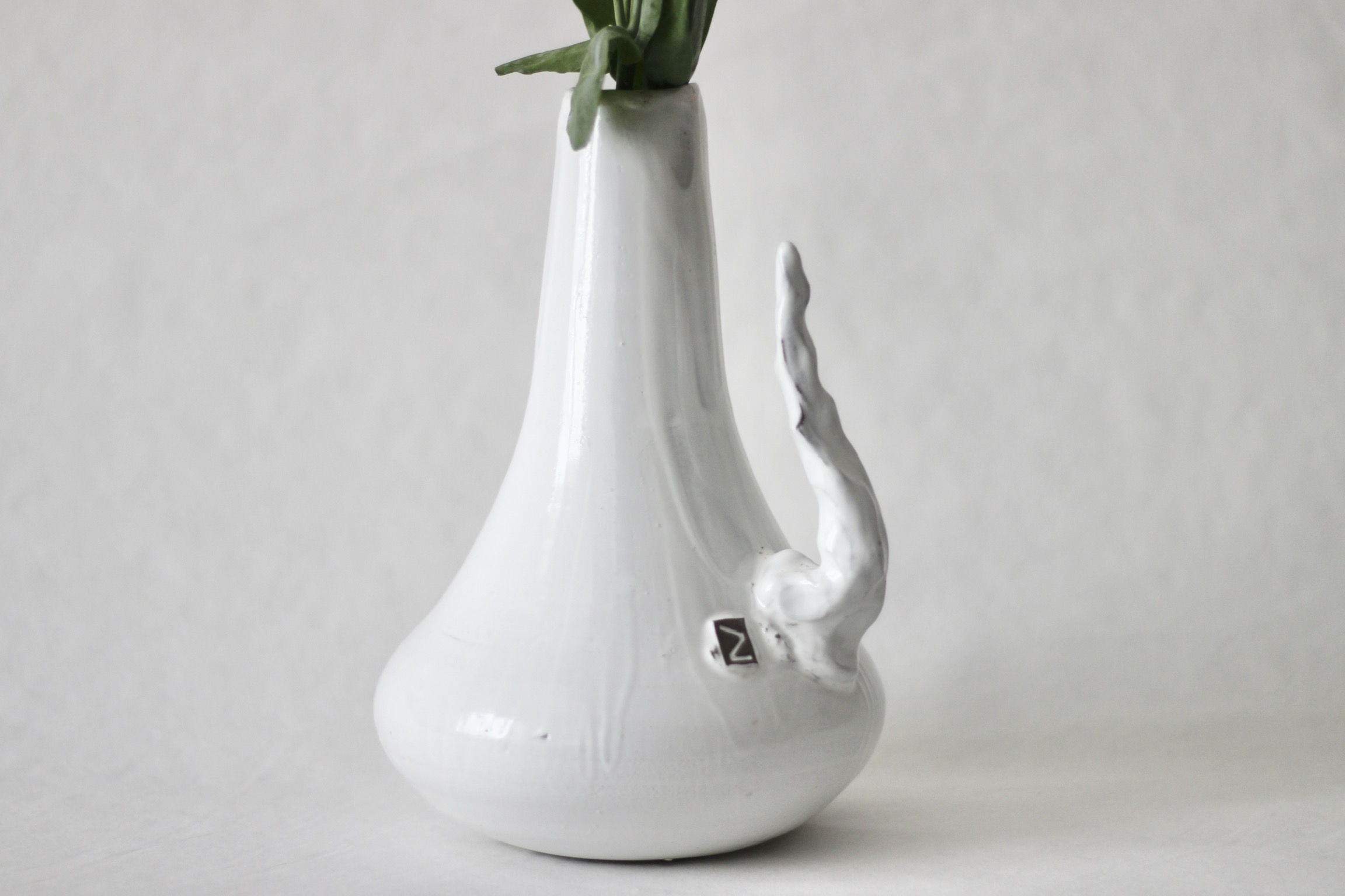 Sprouted Freeform Vase – Handcrafted Ceramic Art with Greenery
