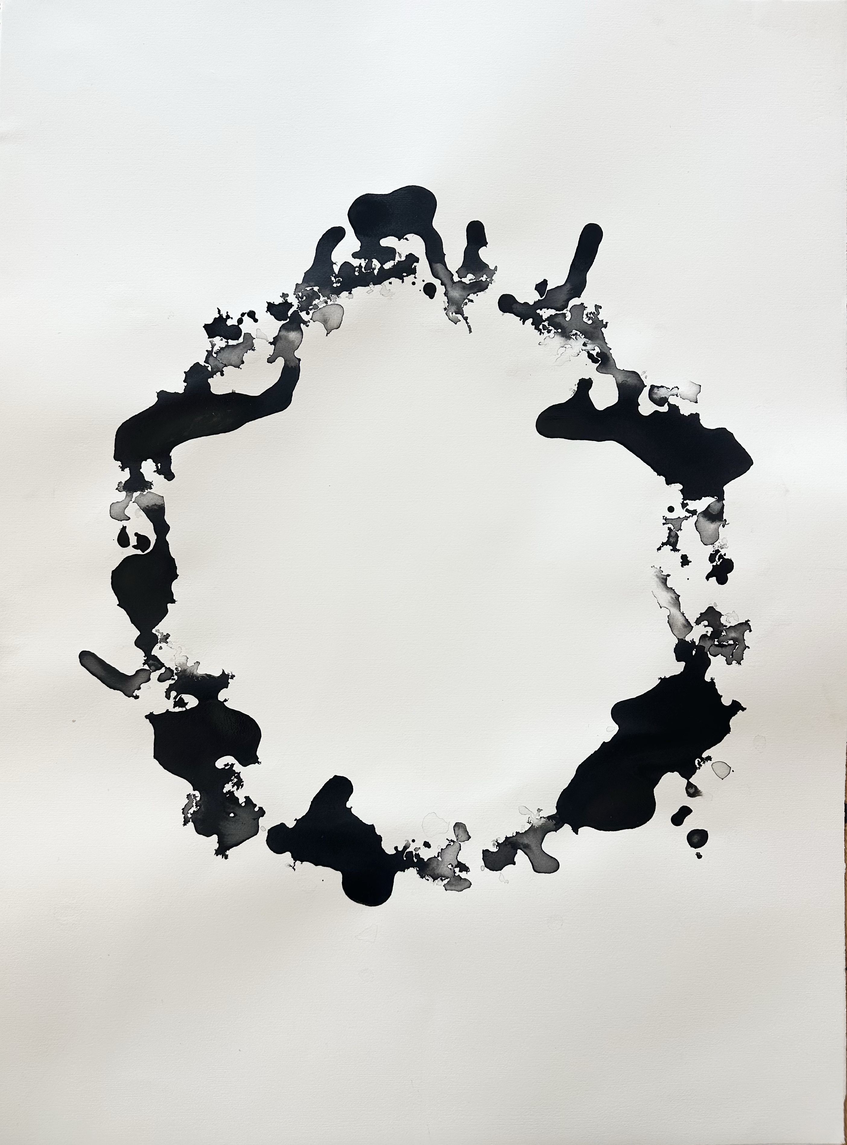 Abstract Black Ink Circle on Paper