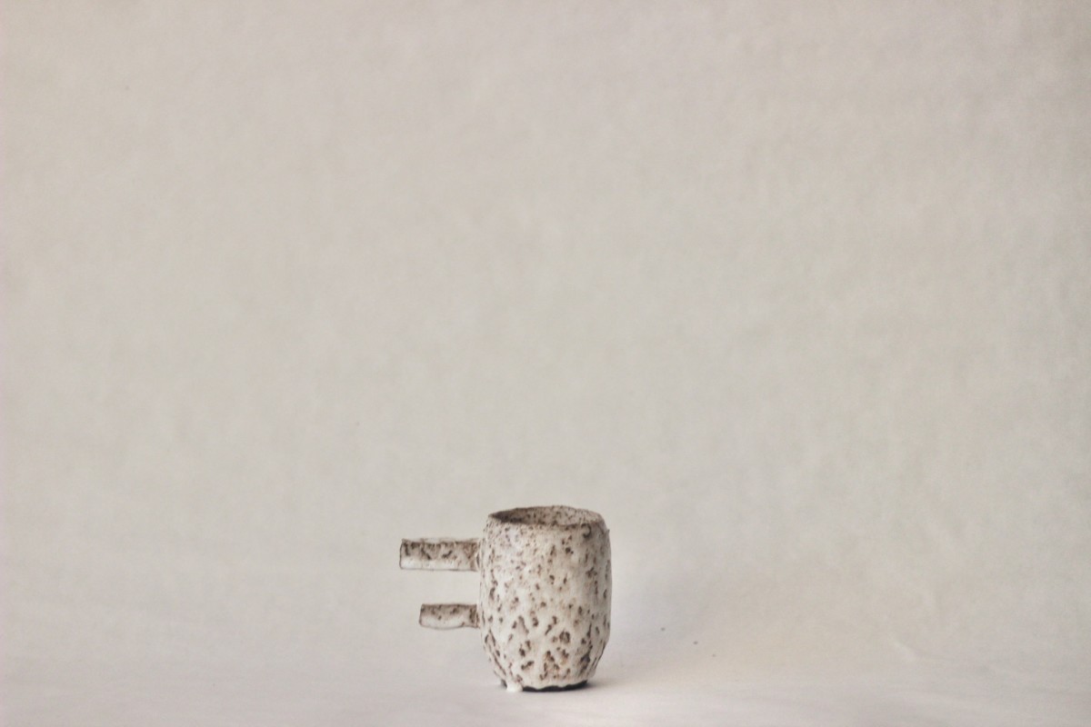 spotty ceramic mug on a white background 2
