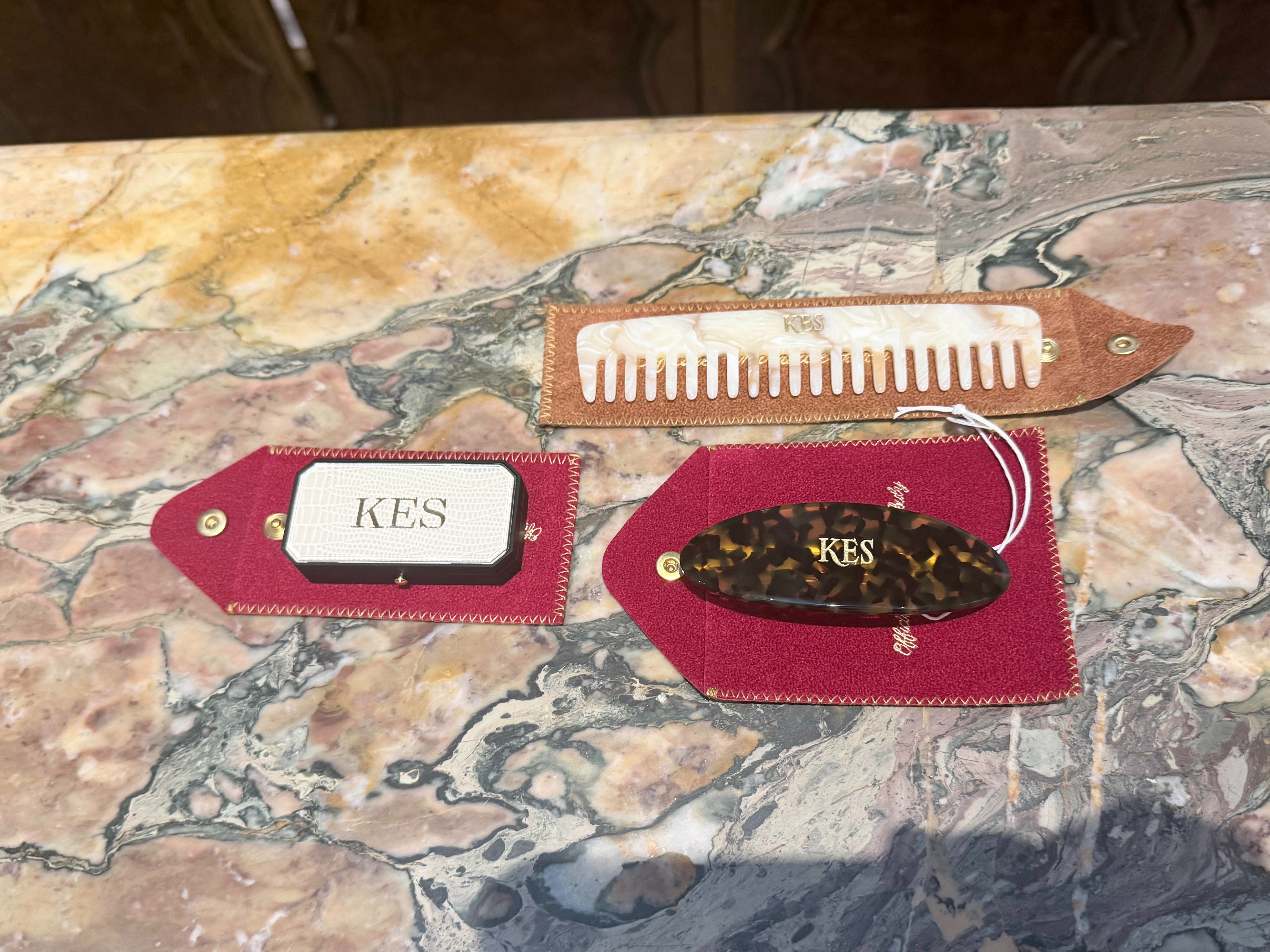 My engraved lip balm, comb, and tortoise barrette from Buly.