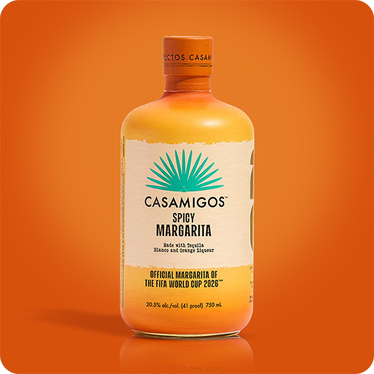 Orange bottle of Casamigos Spicy Margarita with wisps of smoke