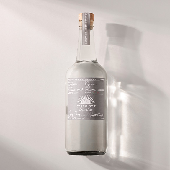 Bottle of Casamigos Cristalino tequila with light and shadows highlighting its clarity