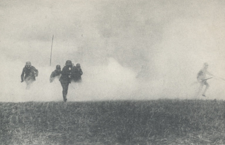 German soldiers advance out of gas cloud - Forces War Records Archive
