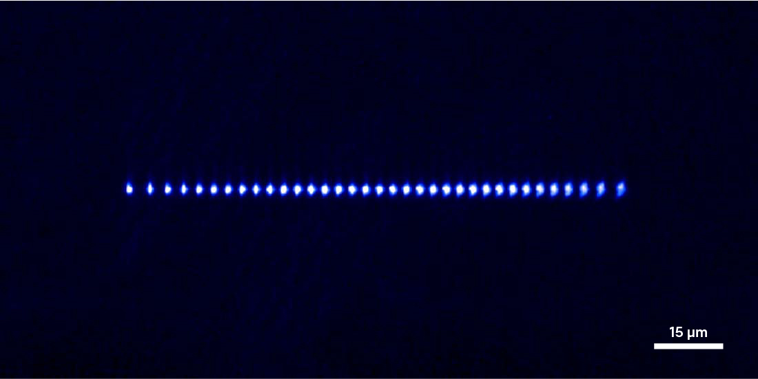 Photograph of a chain of 35 barium ions in an IonQ system

