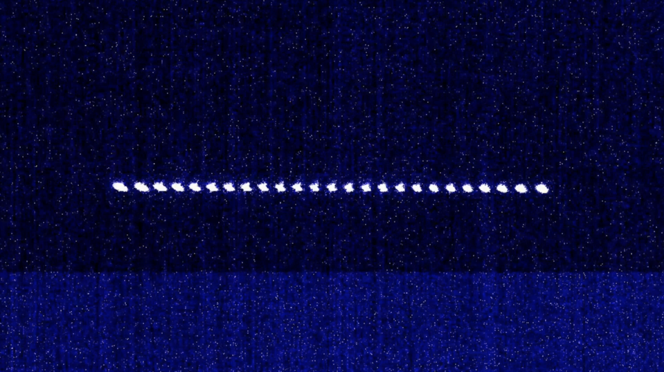 A photo of a chain of ions captured from an IonQ system