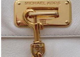 image showing how Michael Kors labels the metal work on its bags