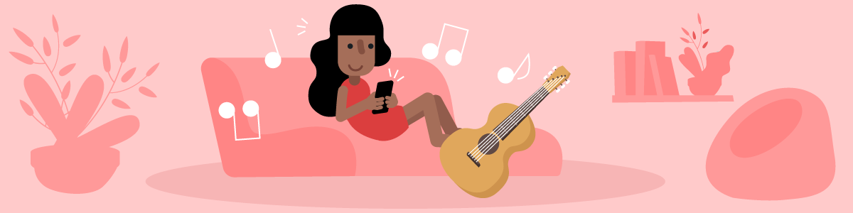 A woman learning to play the guitar with an app