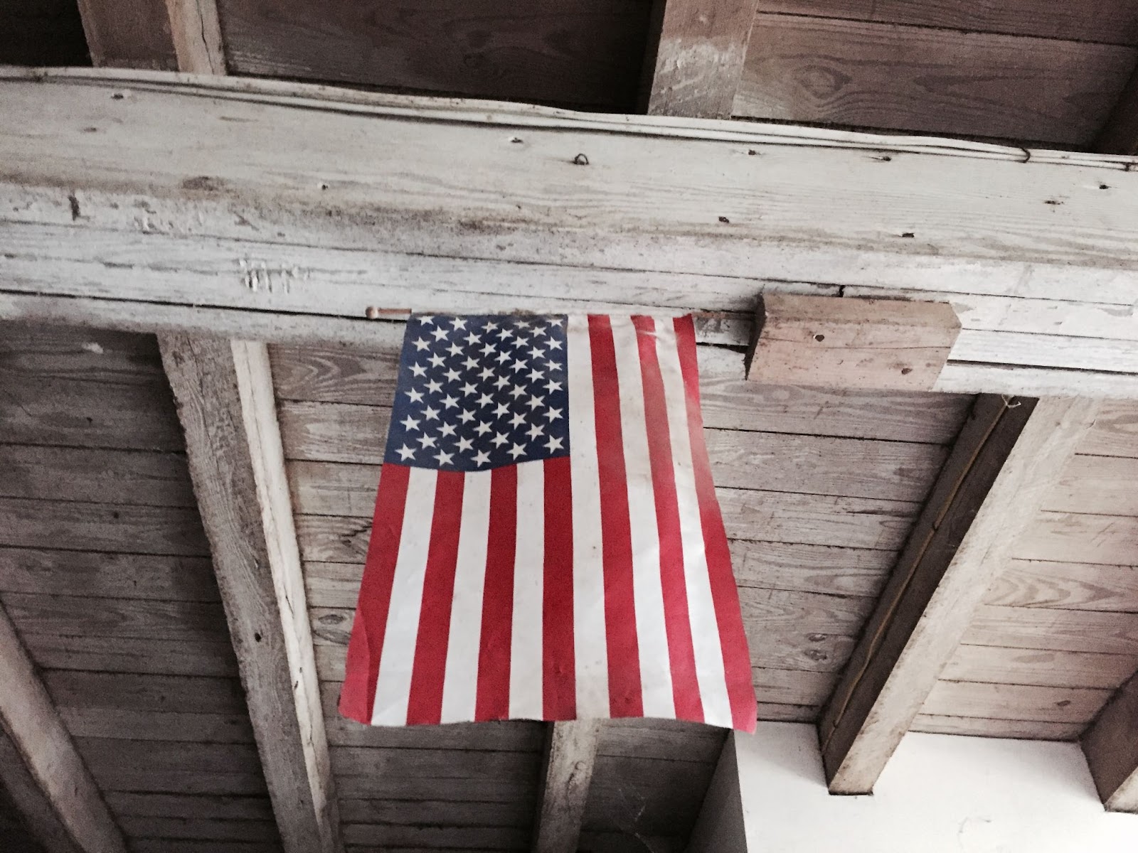 American flag displayed in barn