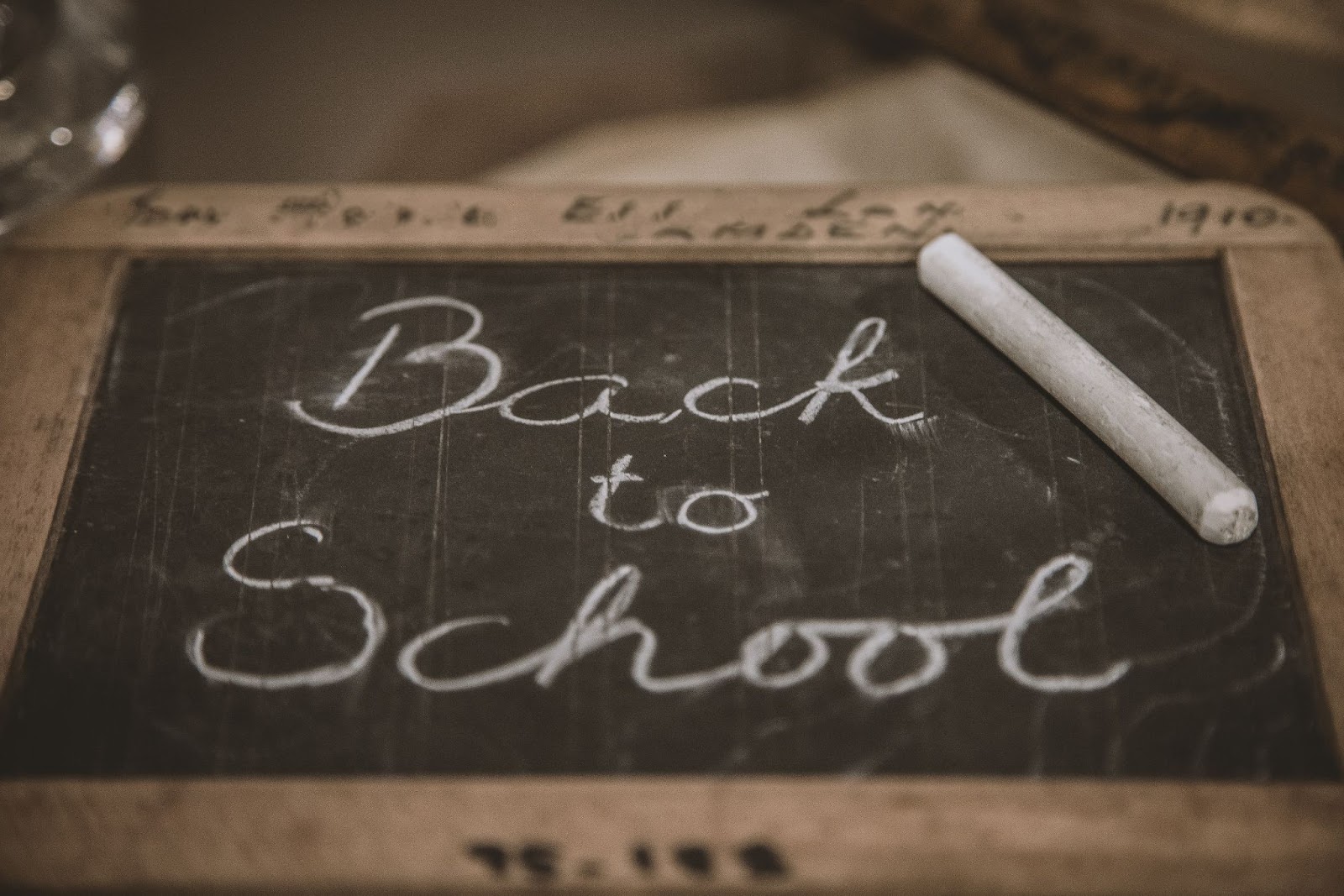 chalk board that says 'back to school' on it