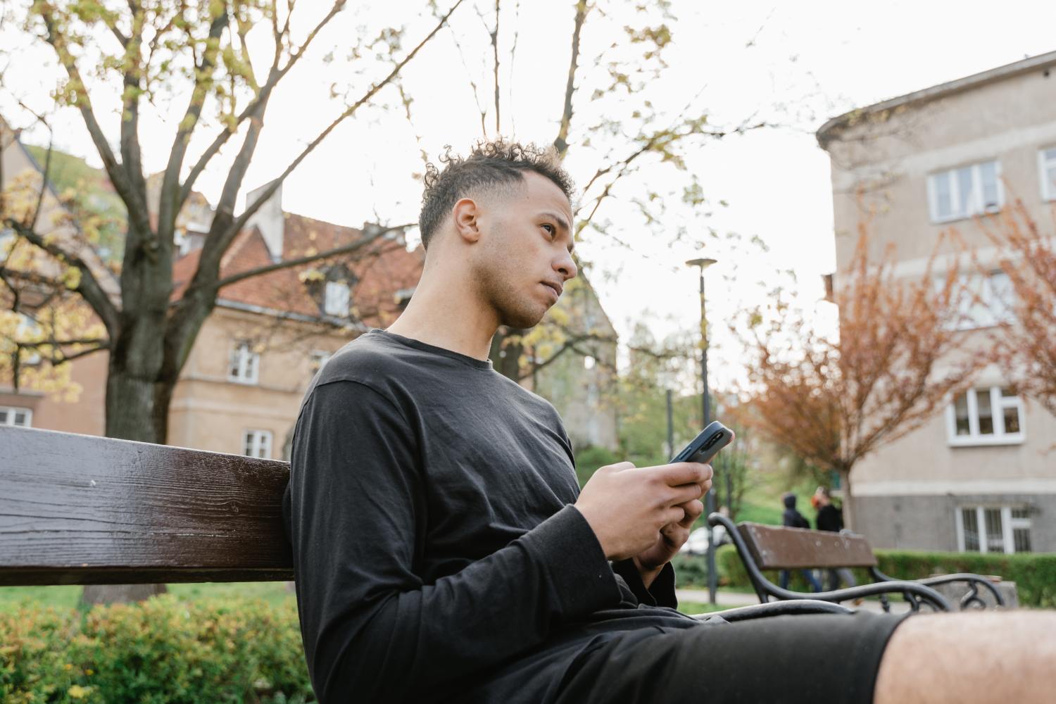 Man on phone looking up the difference between a Trust and estate account.