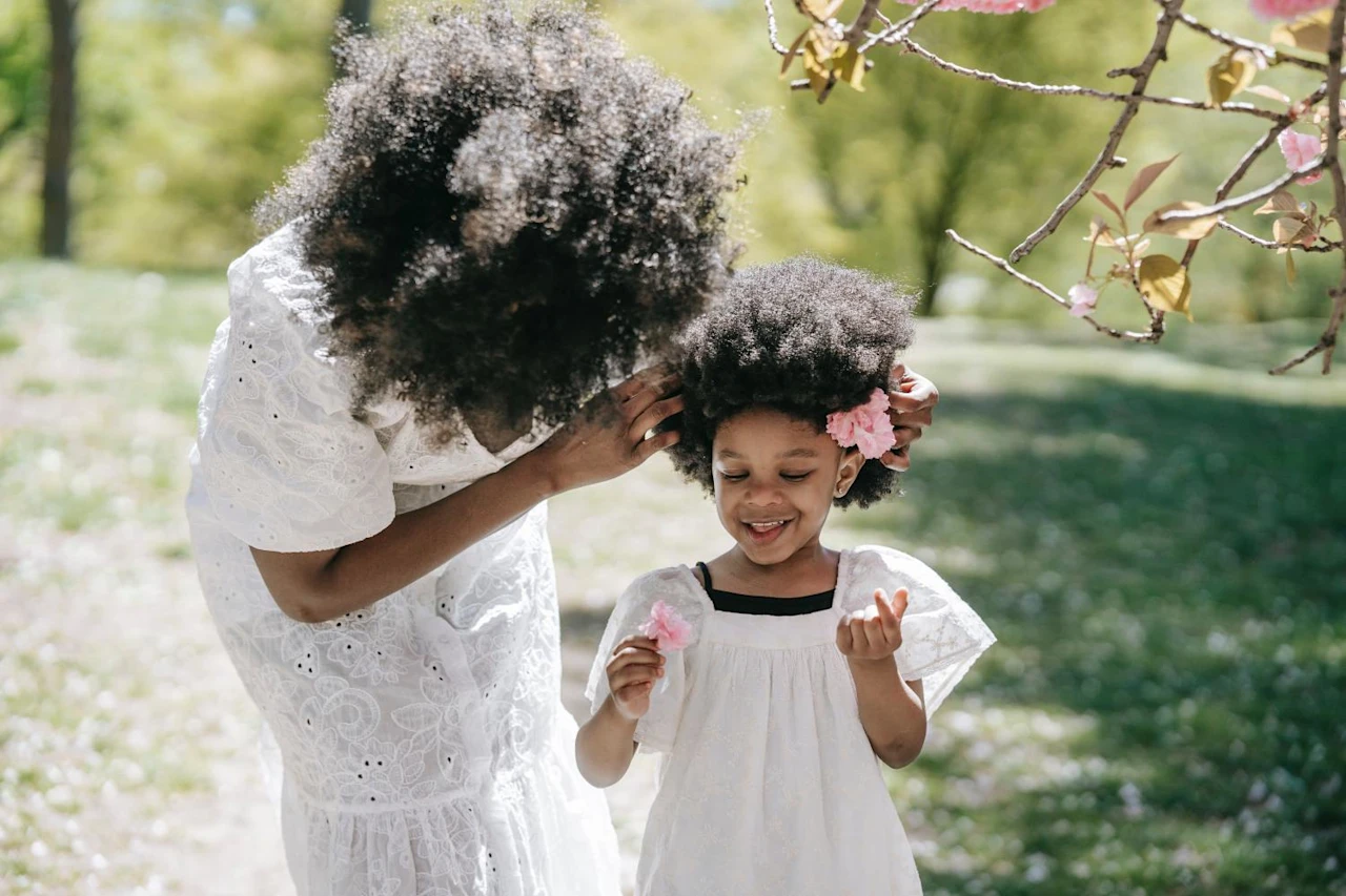 Mother smiling with daughter after learning how to file a petition for probate in California.
