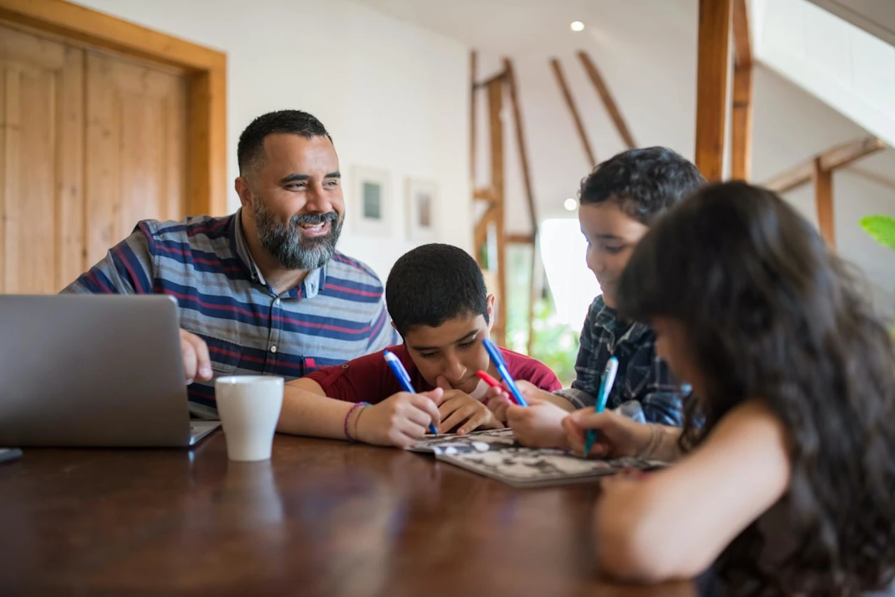 Man with family researching the differences between a survivor's trust and bypass trust.