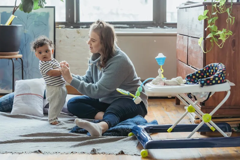 Woman with her child after learning how to set up a see-through Trust.