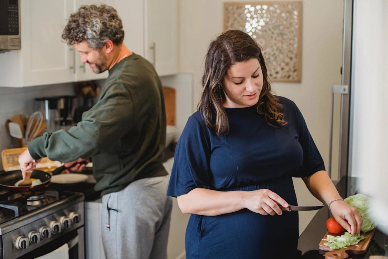 Couple cooking together discussing what happens if you die without a Will.