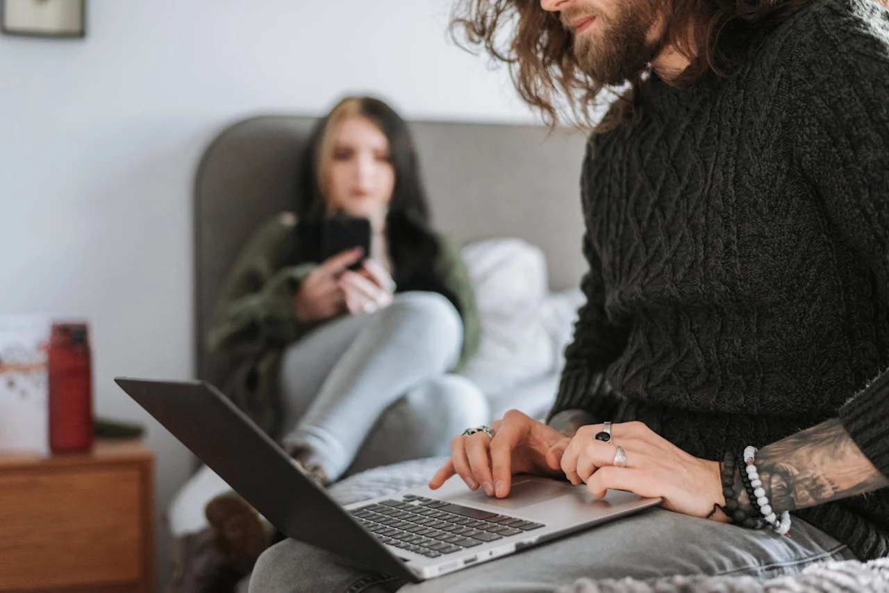 Man on laptop researching marital trust vs bypass trust.