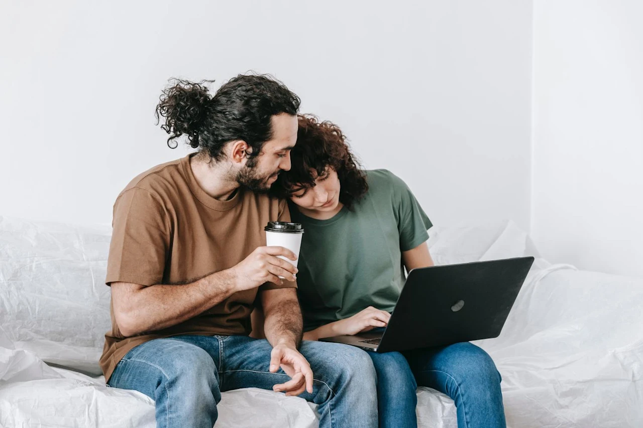 Couple on laptop researching how probate judges work.