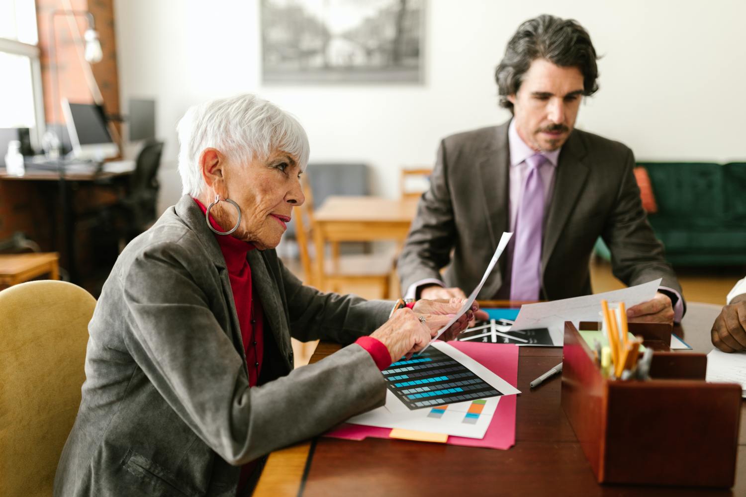 A mother and son going over if he should talk to his children about his estate plan.