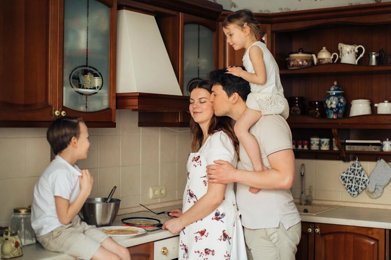 Family cooking together after learning the benefits of choosing a probate attorney near them.