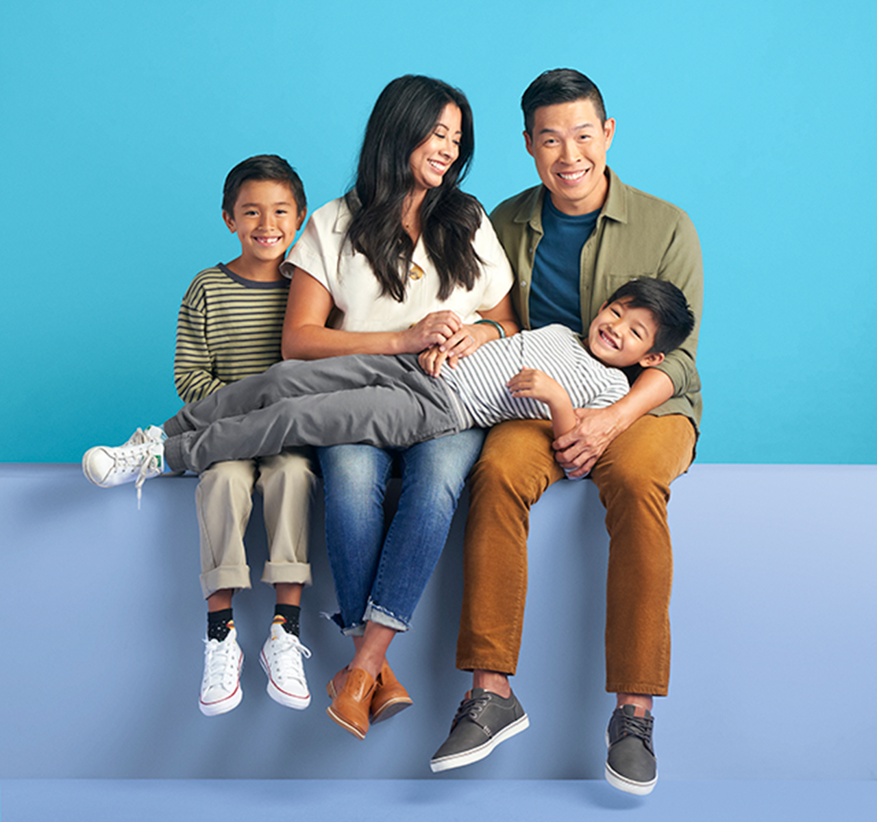 Blue background family with kids