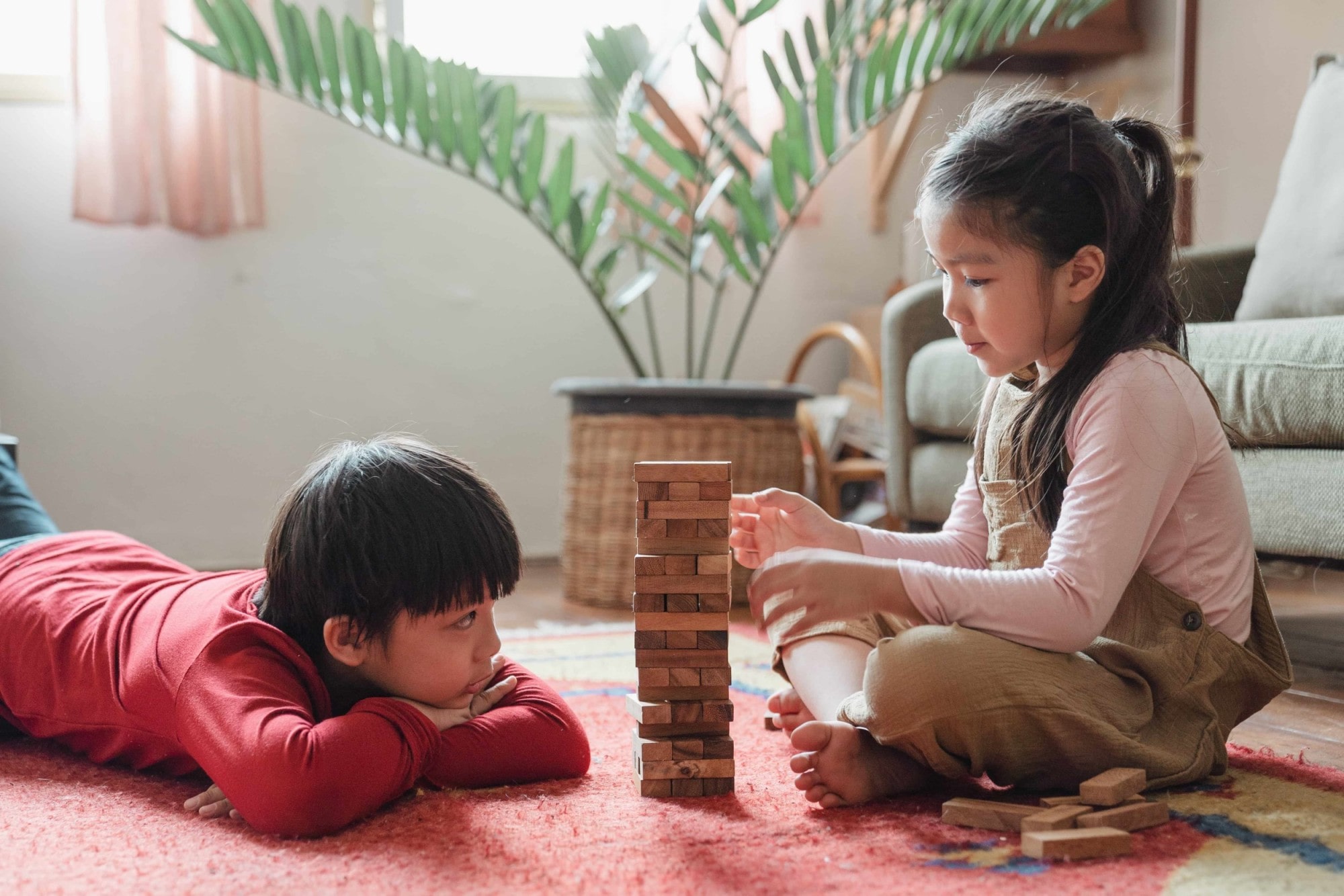 Kids stacking blocks.