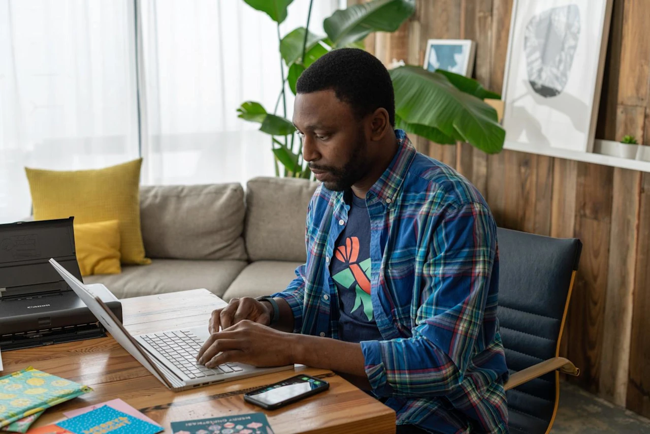 Man on laptop researching what you need to know about Survivor's Trusts.
