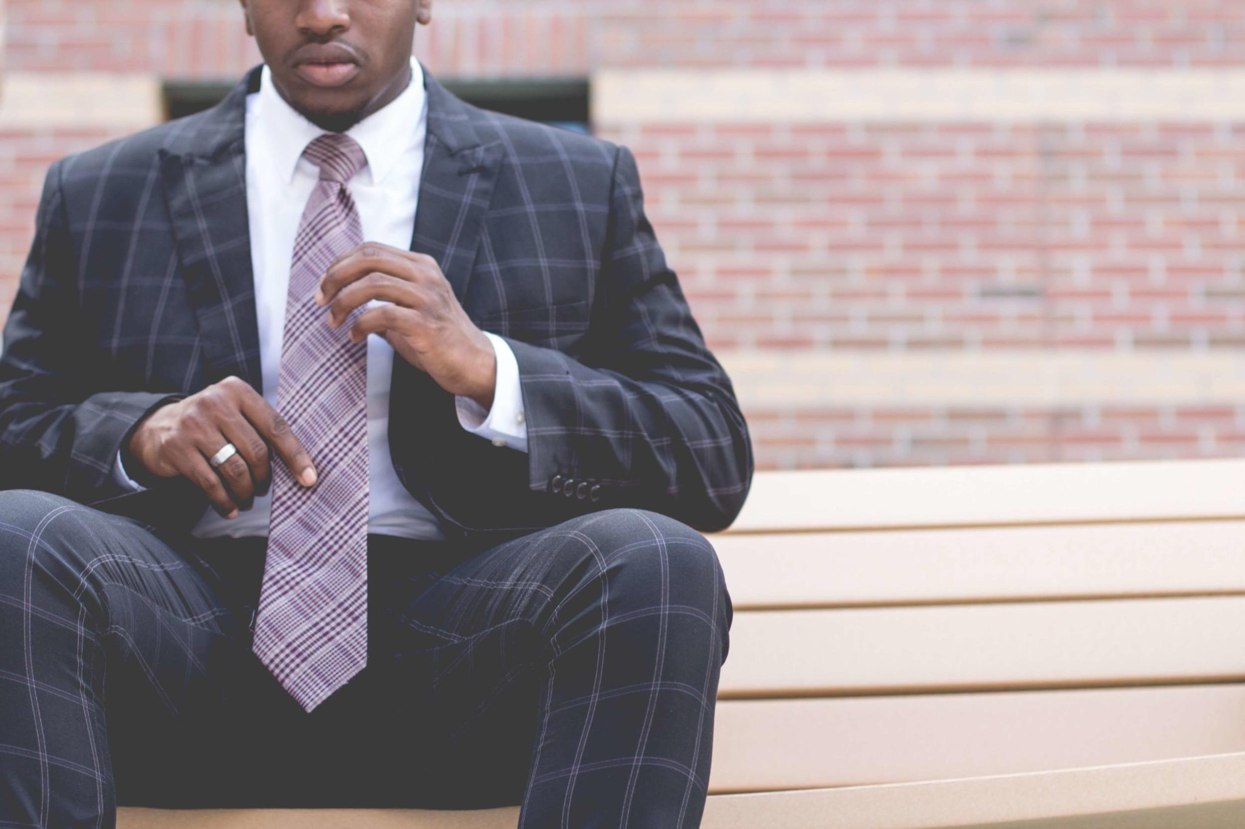 trustee in a suit and tie 