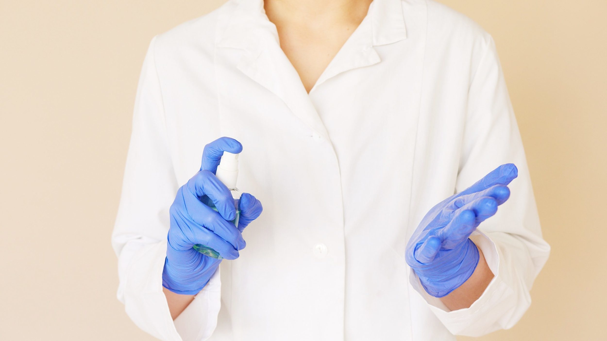 nurse with hand sanitizer 