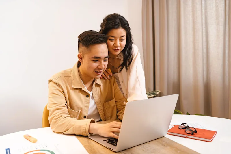 Couple researching mistakes to avoid when taking care of their parents.