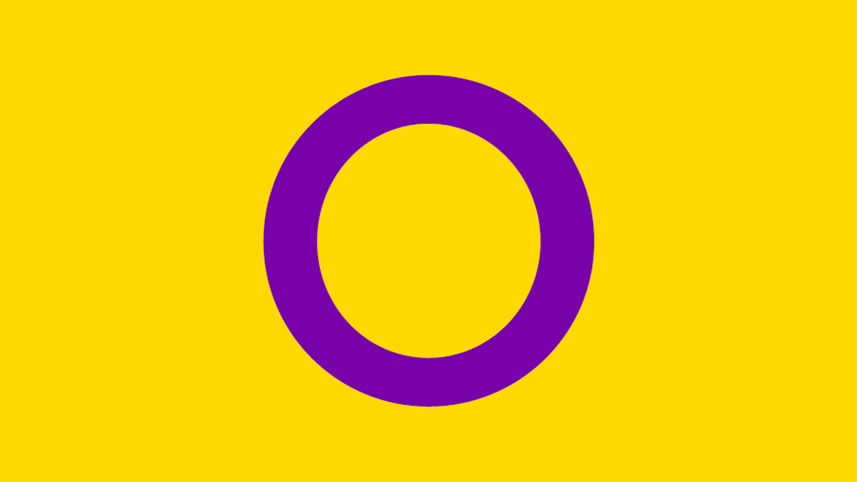The symbol for intersex. Bright yellow background with a purple circle in the middle.