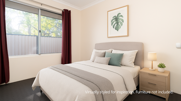 Modern bedroom with neutral tones, a double bed, green accent pillow, nightstand with a lamp and plant, red curtains, and a large window.