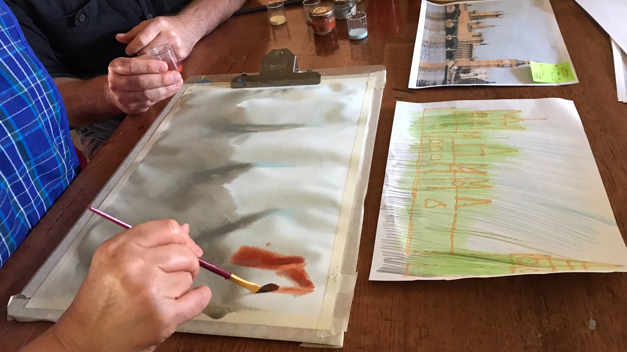 Emily creating a watercolour painting.