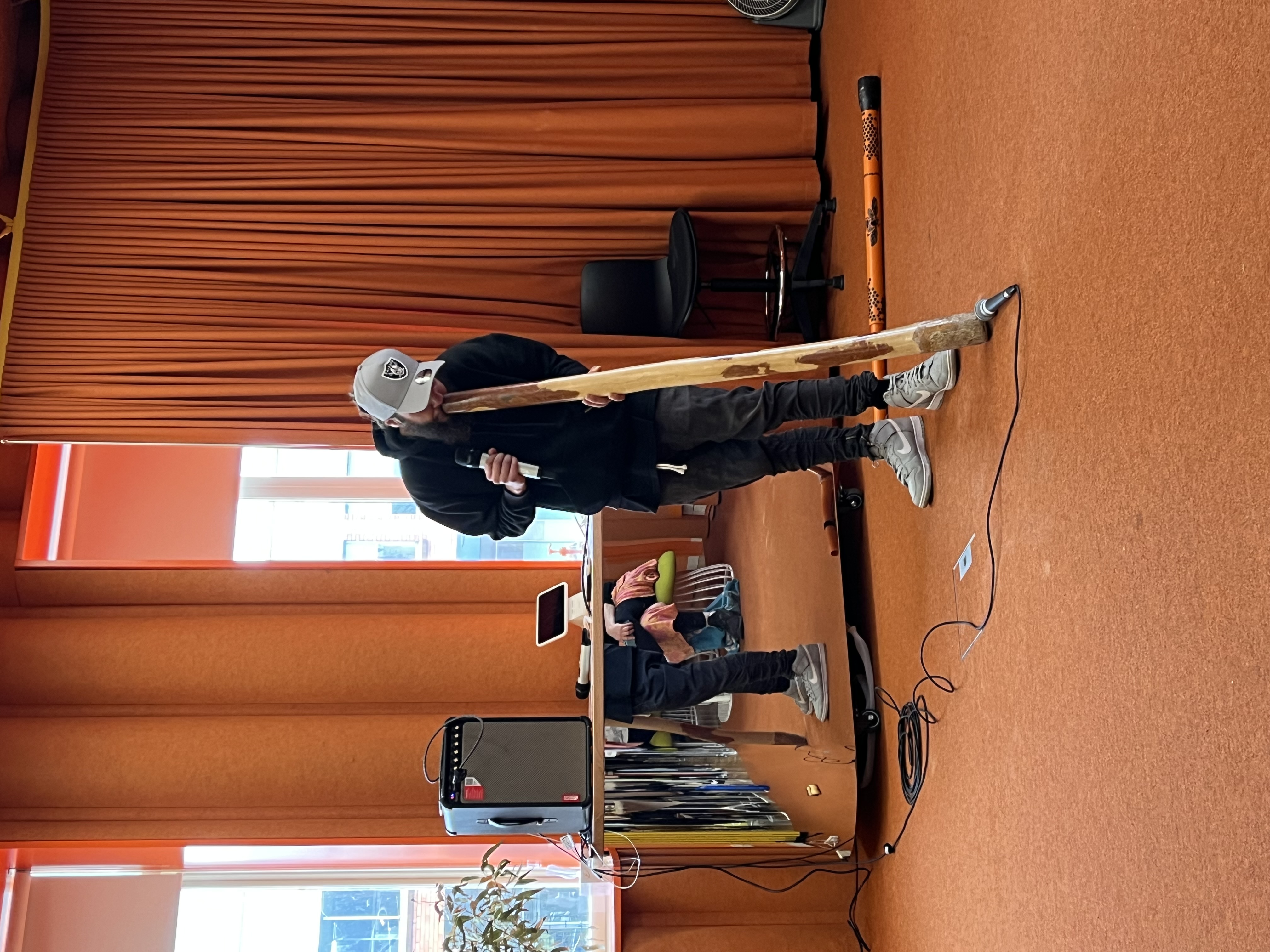 Brent Watkins from @Culture Evolves playing the yidaki (digeridoo) at the City of Darebin's lunch time NAIDOC Week Celebration.