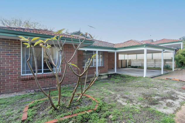 Front entry to house, with undercover carpark