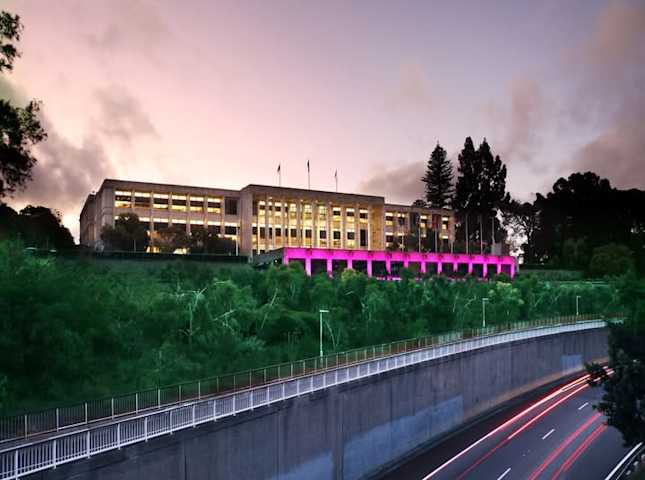 Western Australia Parliament House light up with pink lights.