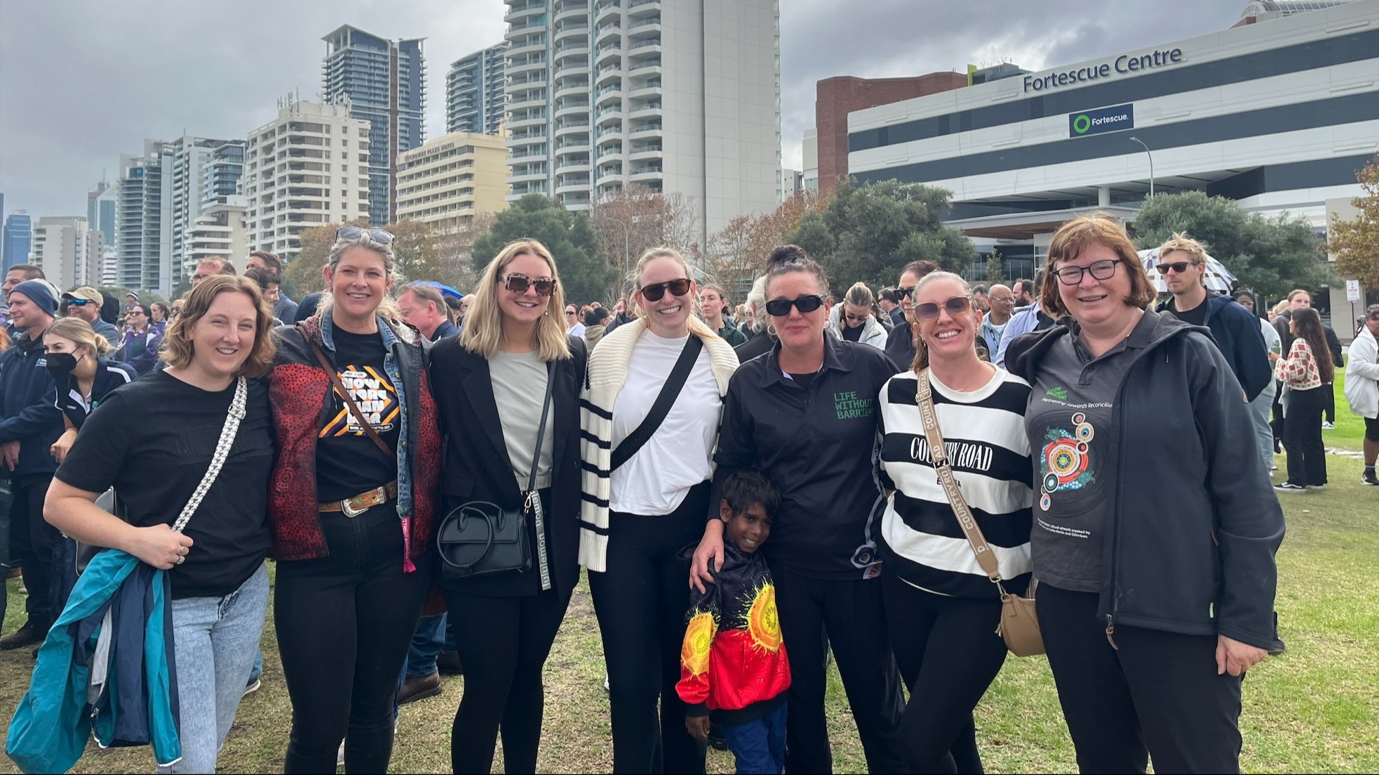 Staff gathered in a group at Wanarayimanha National Reconciliation Week Walk.