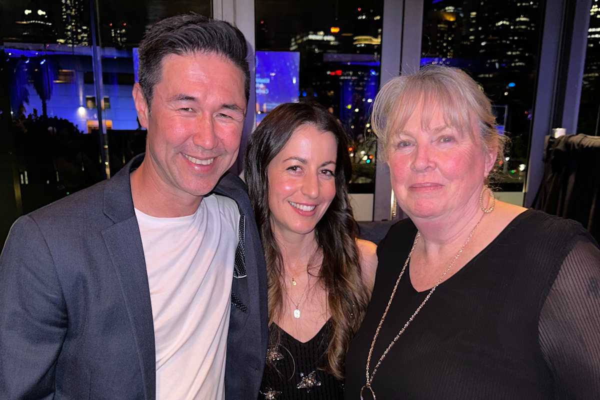 Chris, Jacintha and Jacintha at the dinner.