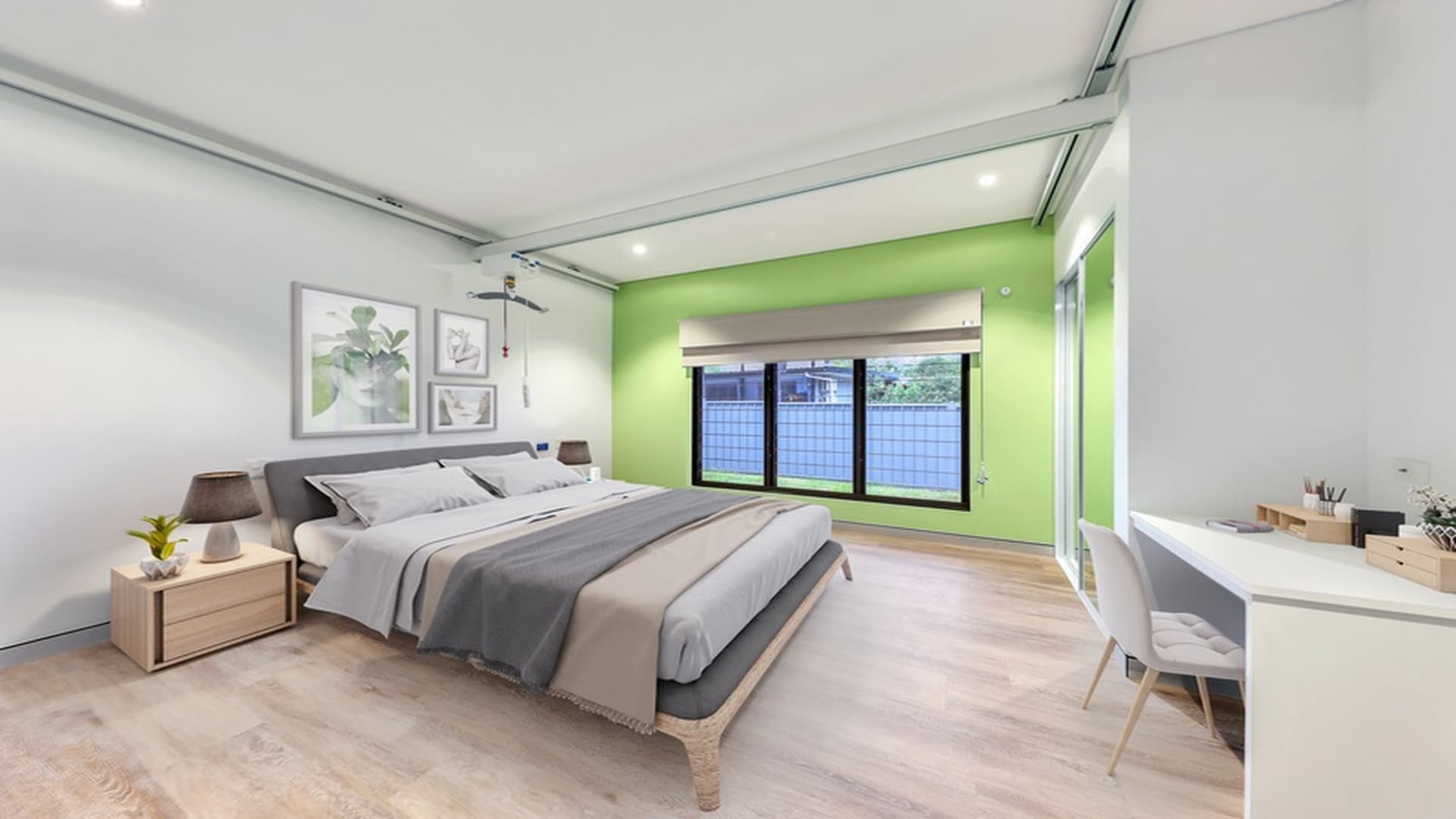 Spacious bedroom with louvres and green feature wall, combined with hard flooring and desk.
