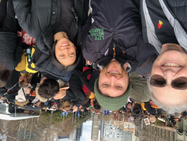 Nicole Hassall, Executive Officer, VDAS, Felix Beilby, Strategy and Support Manager, and Talia Sugiyama, Data and Reform Analyst at the Naarm NAIDOC March, smiling at the camera.